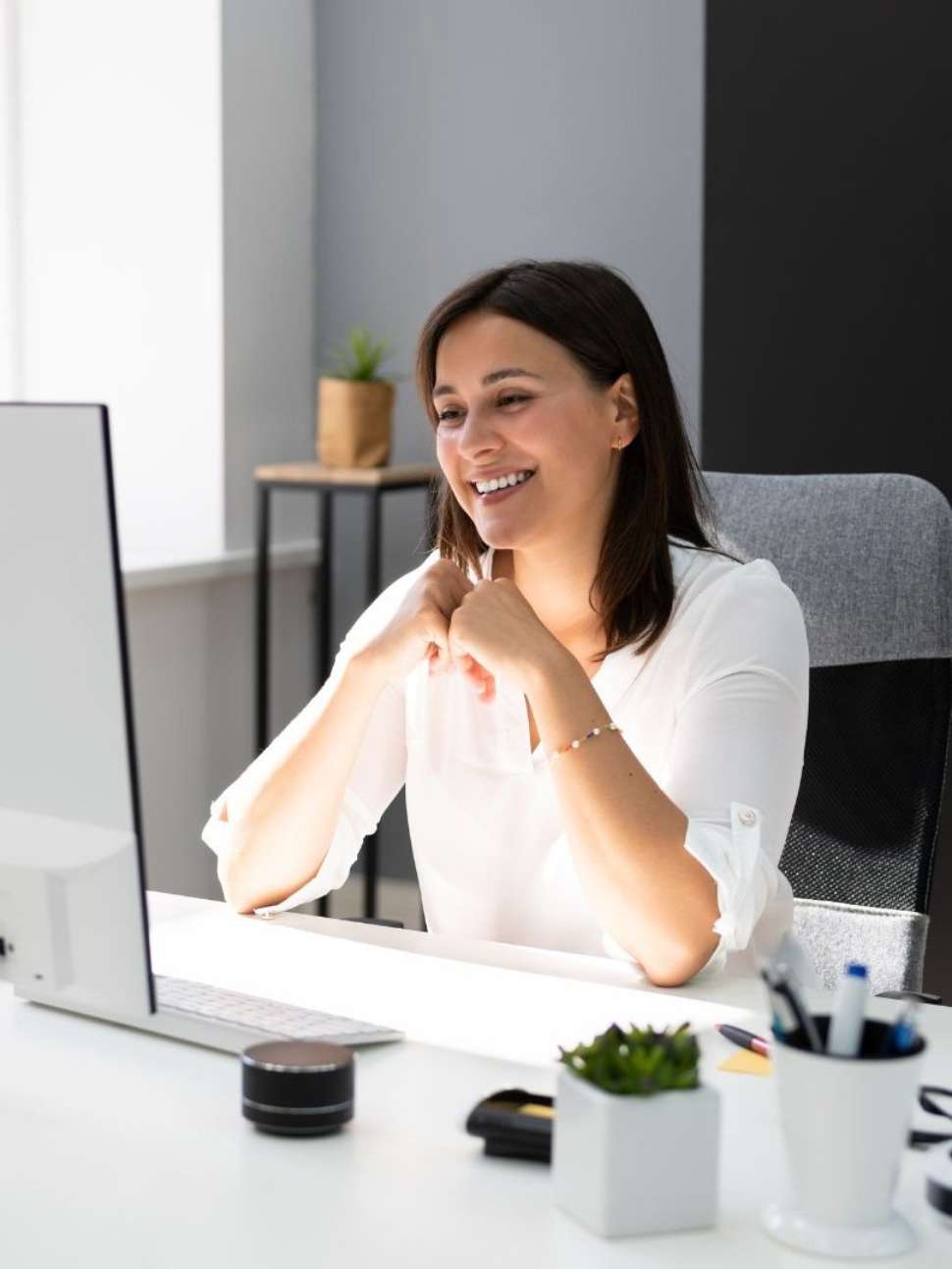 Female counsellor assisting a student digitally